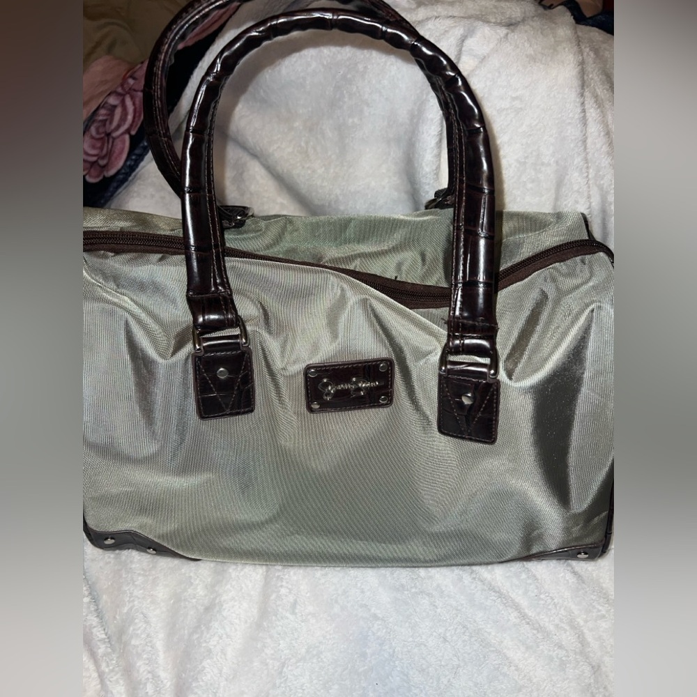 Jessica Simpson duffle bag with long strap